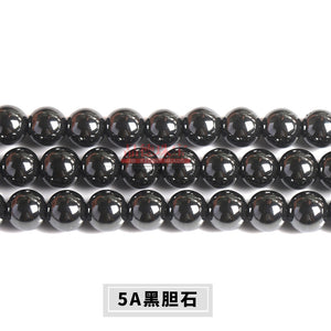 Manufacturer's direct supply of black bile stone loose beads DIY jewelry accessories, wholesale of black iron stone magnet stone loose beads, black bile stone beads