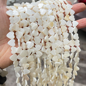 Wholesale of 7-8mm natural freshwater white seashells, irregular shaped scattered beads, DIY accessories, and accessories for white Fritillaria